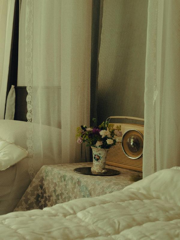 antique bedside table with lace and flowers vintage décor Windsor Ontario