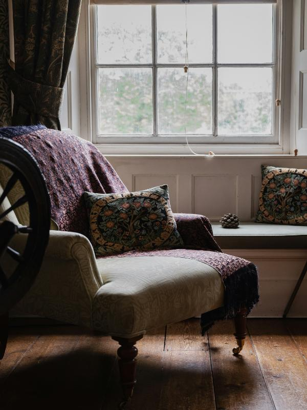 vintage chair by window with sheer curtains antique home décor