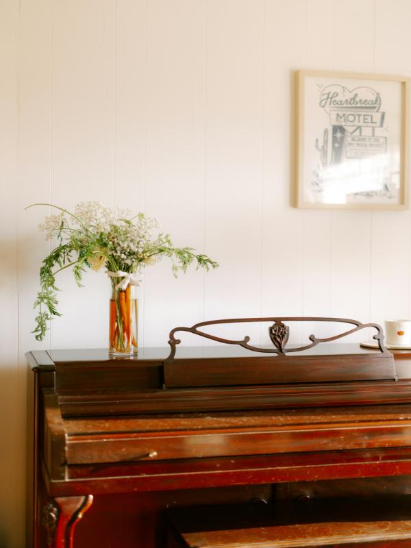 vintage upright piano with plant classic home décor